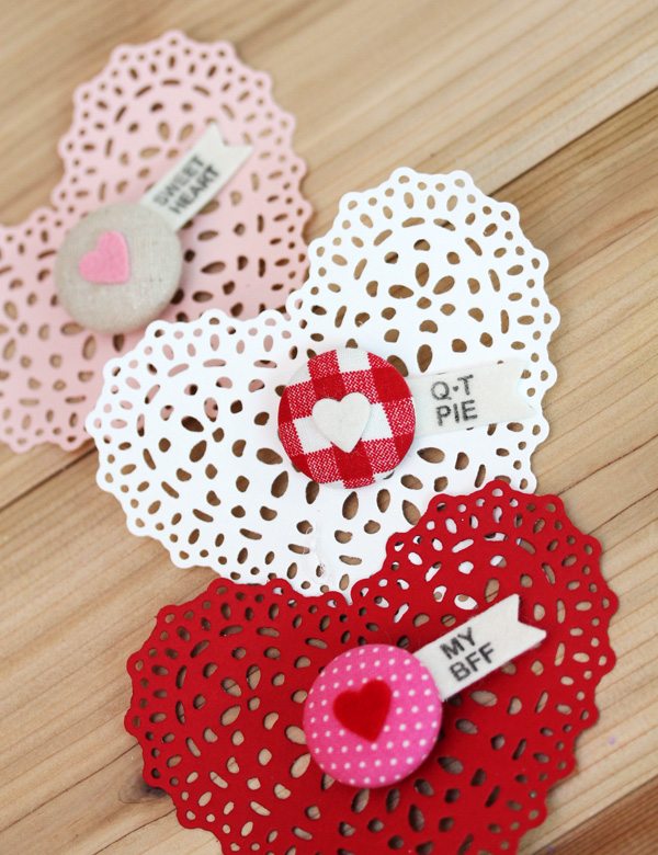 Trio of heart doilies with button pins