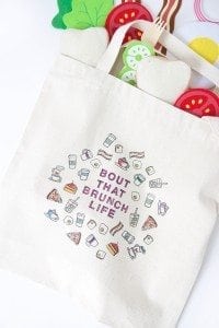 Use a few supplies to create a customized diy stamped canvas tote bag that you can color with fabric markers