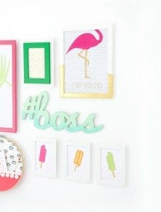 Gallery Walls can be intimidating, which is why I've avoided them until recently. Create your very own colorful Cricut Explore Gallery Wall with just a few cheap frames and some simple craft supplies.