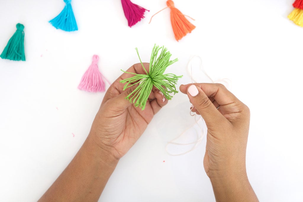 Use embroidery floss to create bold DIY tiered tassels for your beach tote.