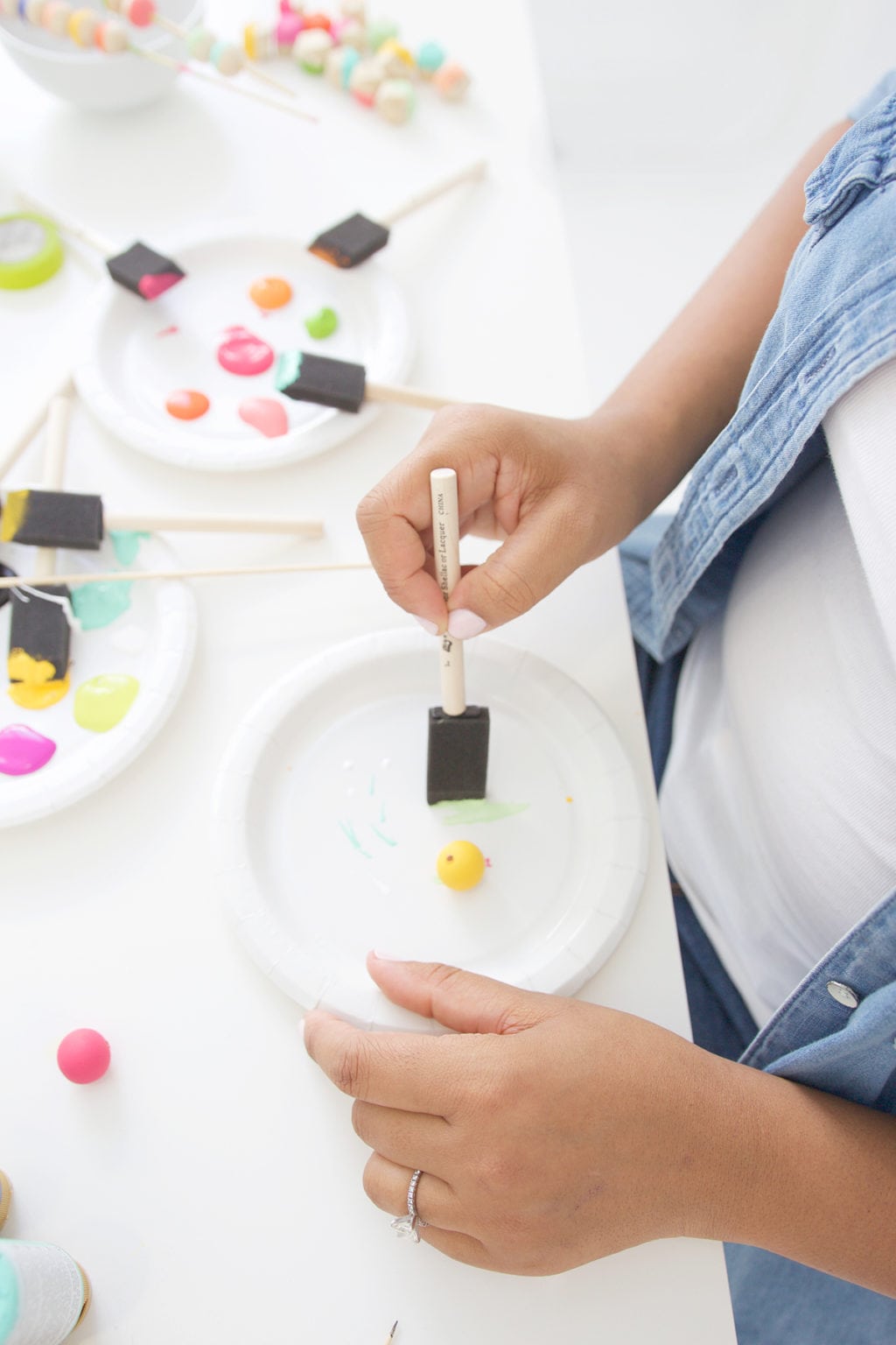 Grab some paint and learn how to paint wooden beads in a variety of different patterns..