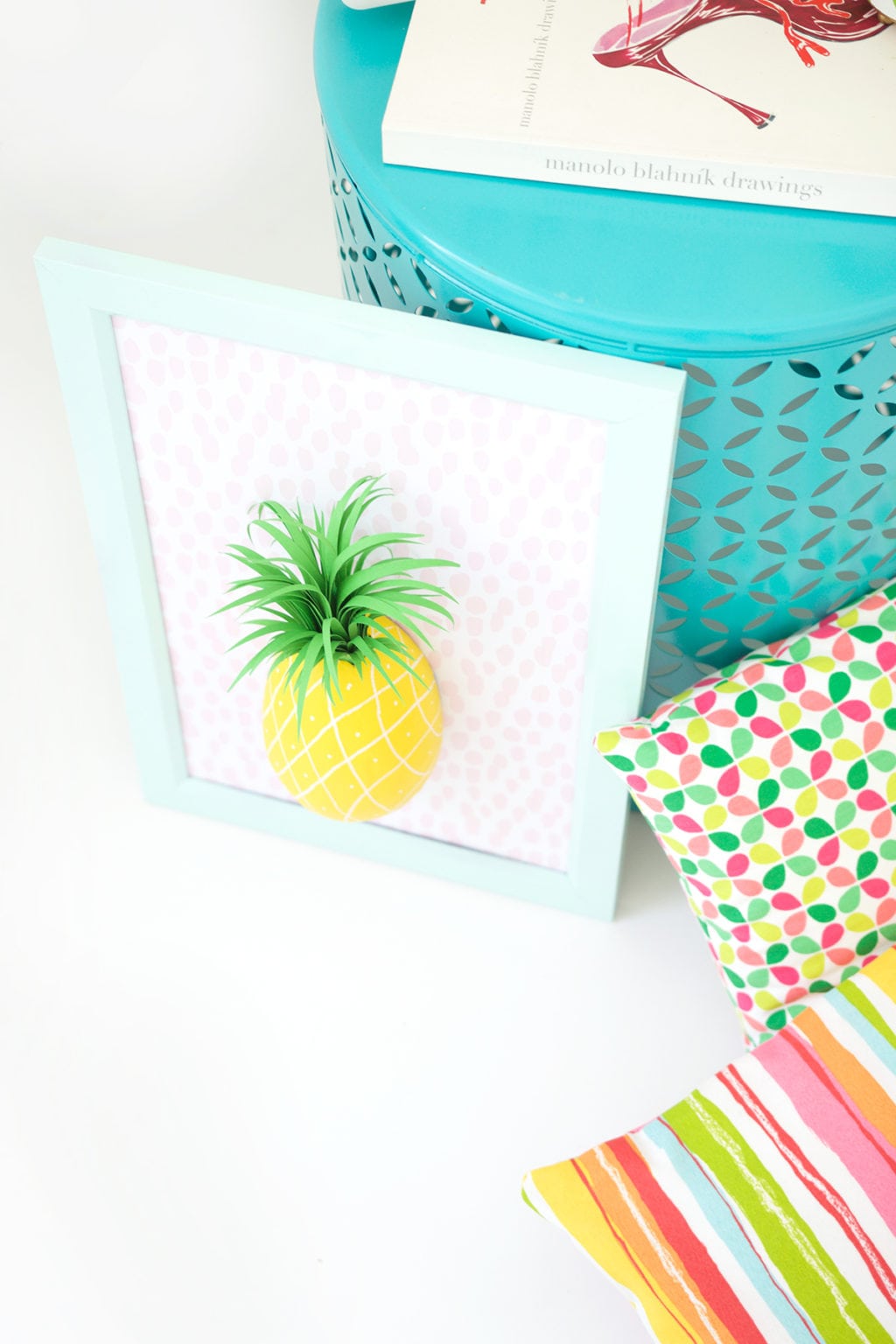 Mimic the look of taxidermy with a paper mache egg and some paint. This 3D diy paper mache pineapple wall art is a show stopper and a perfect addition to your gallery wall.