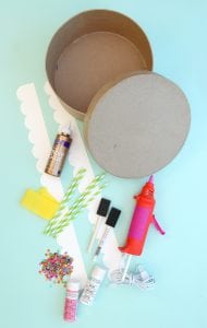 Create your own party out of paper. Use a paper mache box to create a DIY birthday party in a box using simple supplies and fill it up with a few birthday treats