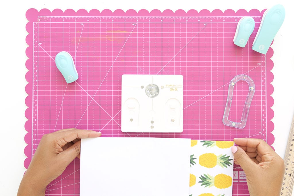 Introducing the new We R Memory Keepers Staple Board that let's you staple anywhere on the page. Use it to create these Easy Stapled Notebooks in minutes