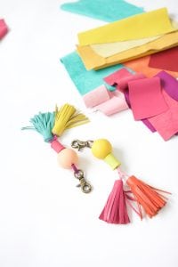 Tassels will never go out of style so why not create these leather and wood bead tassels in just a few steps.Your tote bag will thank you.