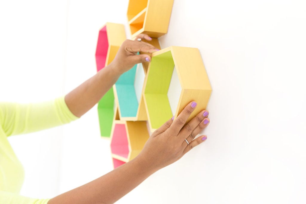 Create these DecoArt Metallic Hexagon Wall Shelves using DecoArt gold metallic paints to add perfect shimmer to your office walls.
