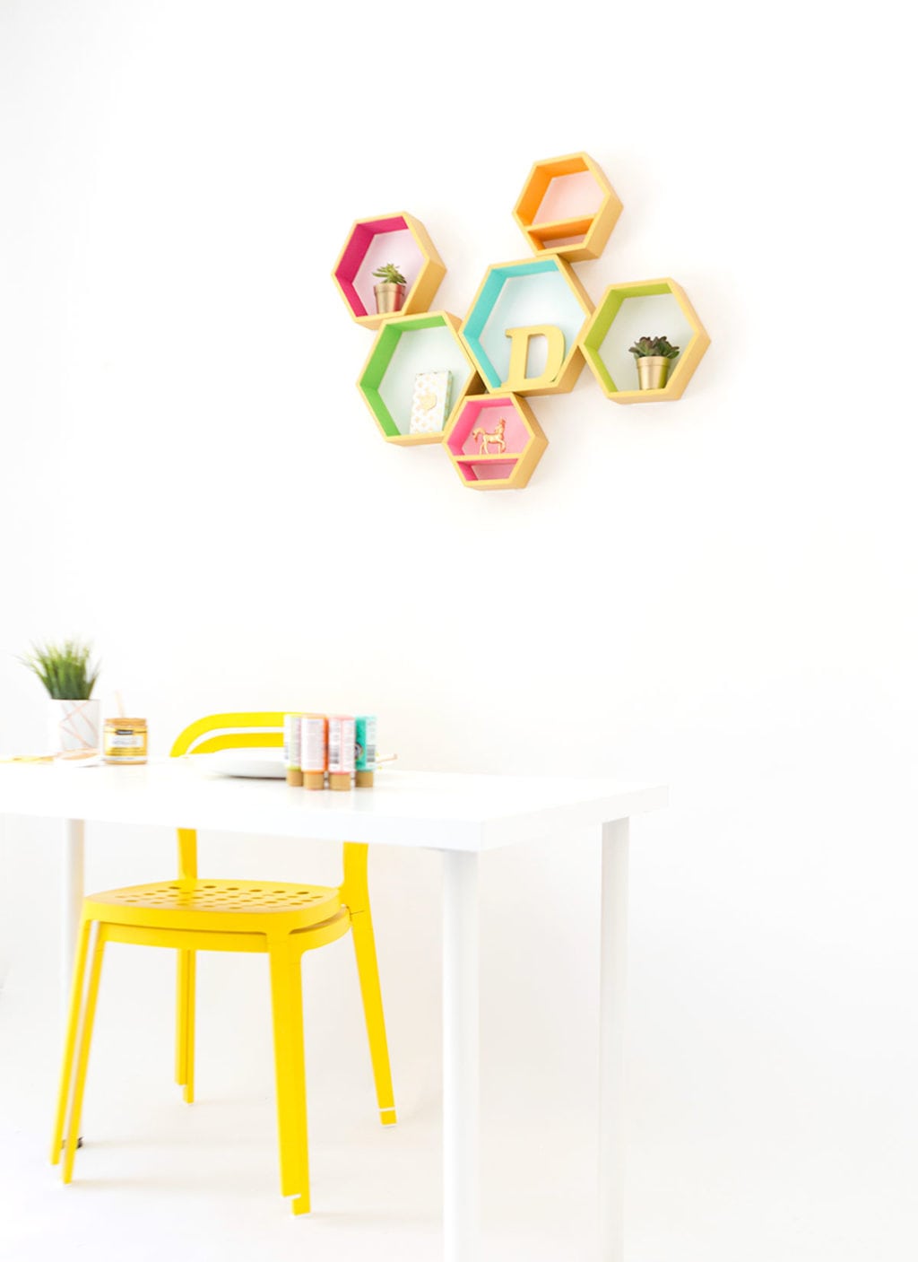 Create these DecoArt Metallic Hexagon Wall Shelves using DecoArt gold metallic paints to add perfect shimmer to your office walls.