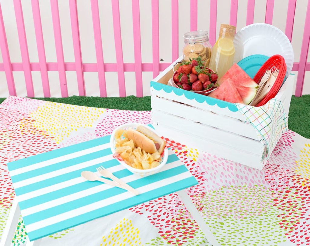 Enjoy the outdoors with this DIY Wooden Crate Picnic Basket that is easy to create with paint and simple tools. Great for enjoying the end of summer. 