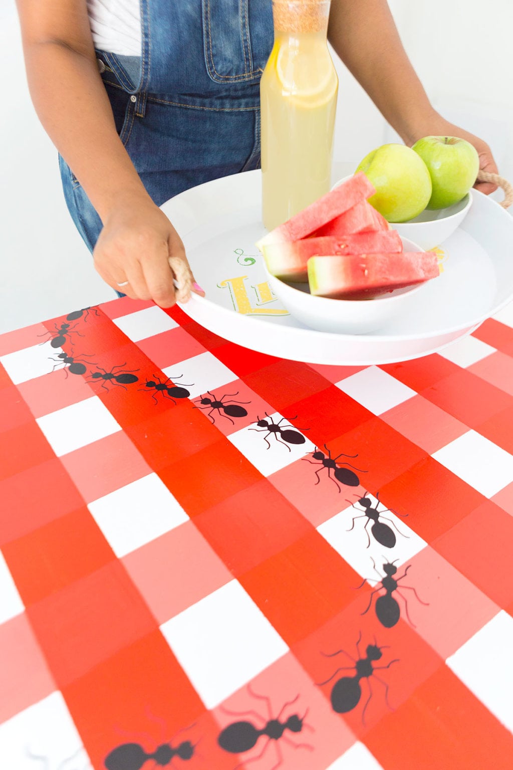 Learn how to paint gingham onto your table top and create the perfect place for hosting indoor picnics year round!