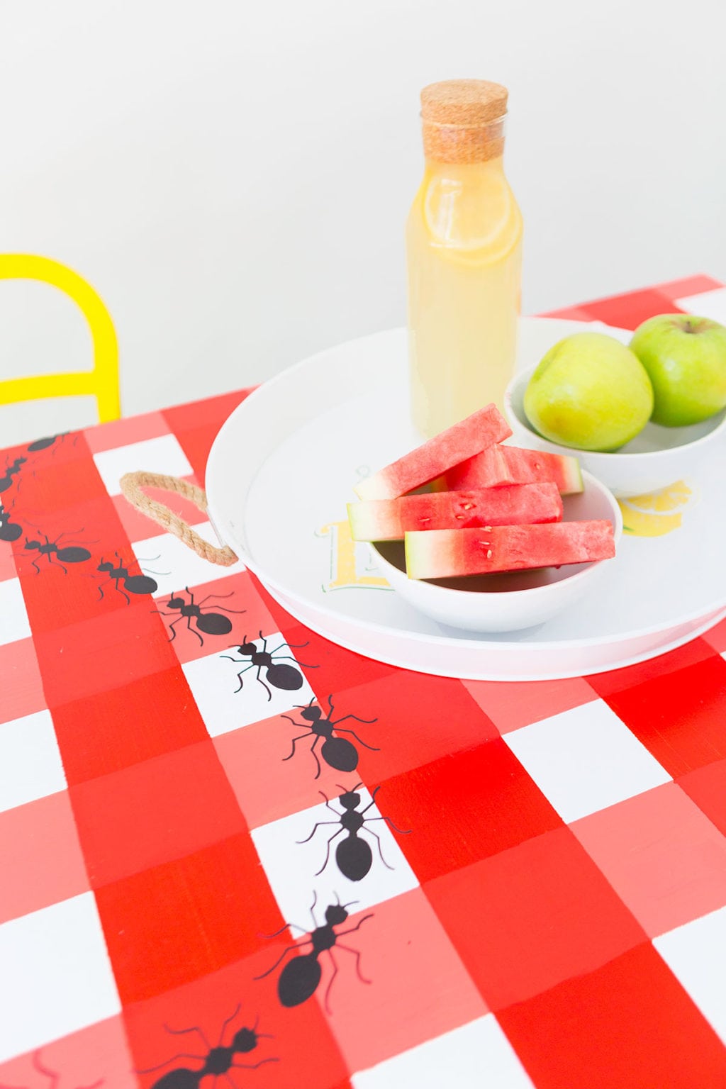 Learn how to paint gingham onto your table top and create the perfect place for hosting indoor picnics year round!