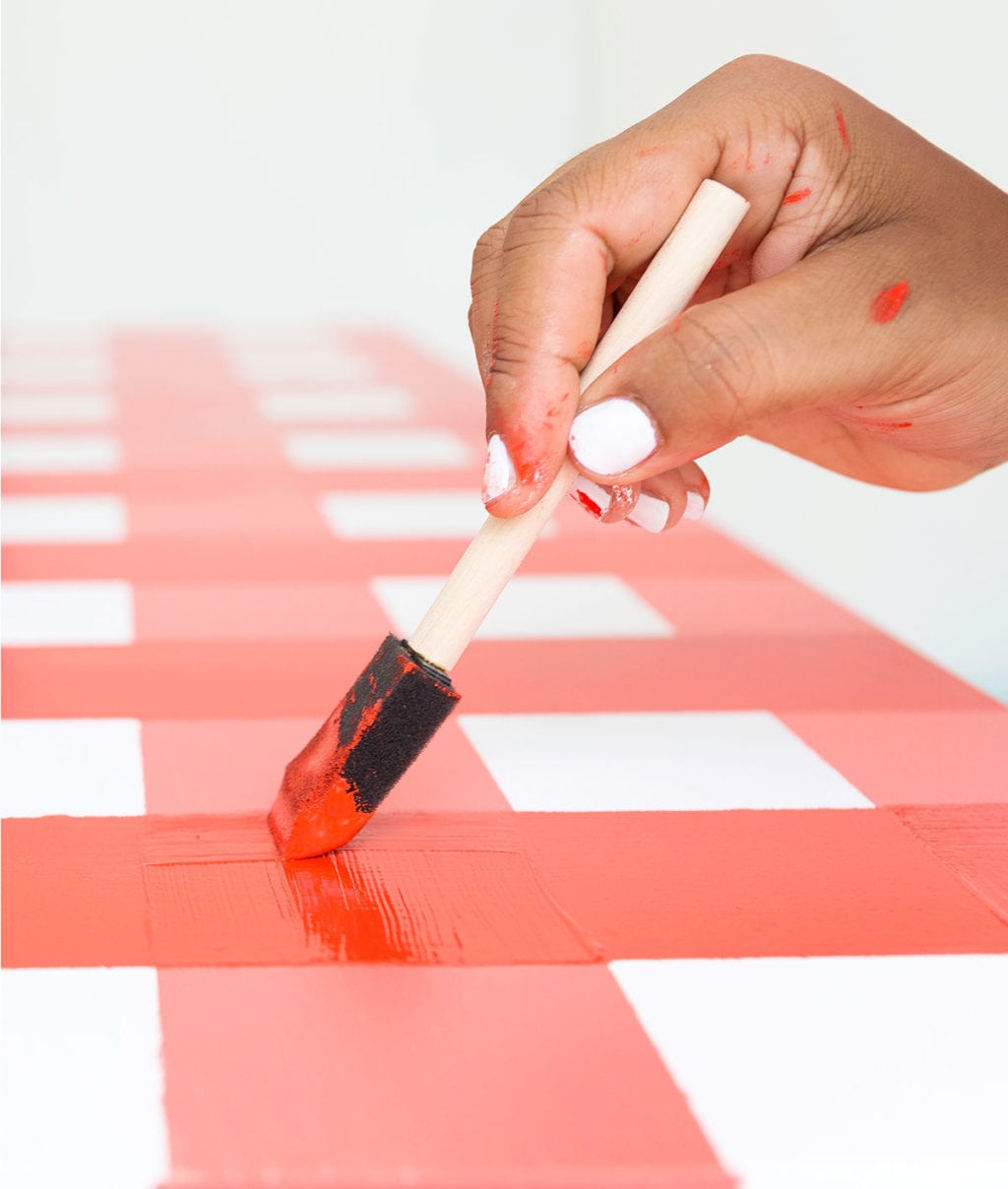 Learn how to paint gingham onto your table top and create the perfect place for hosting indoor picnics year round!