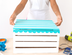 Enjoy the outdoors with this DIY Wooden Crate Picnic Basket that is easy to create with paint and simple tools. Great for enjoying the end of summer.