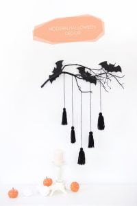 give your spooky decor a mod makeover with this easy to make Modern Halloween Wall Decor project using DecoArt Outdoor Living paint