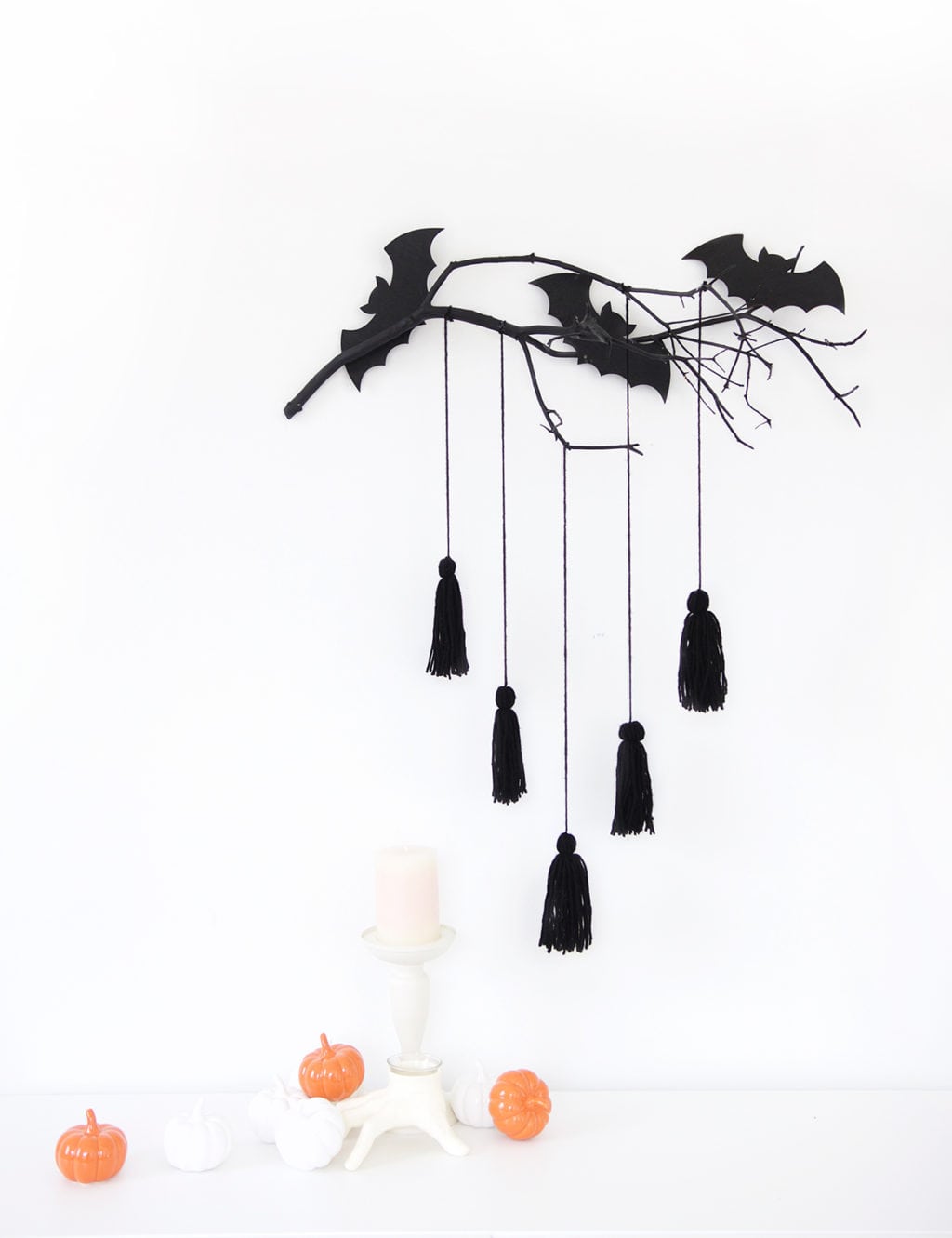 give your spooky decor a mod makeover with this easy to make Modern Halloween Wall Decor project using DecoArt Outdoor Living paint