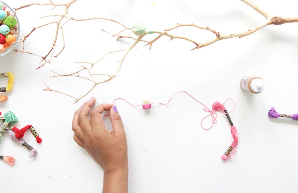 This painted wood bead manzanita branch is a funky take on the beauty of nature! A crafty way to use your painted wooden beads with a few basic supplies. 