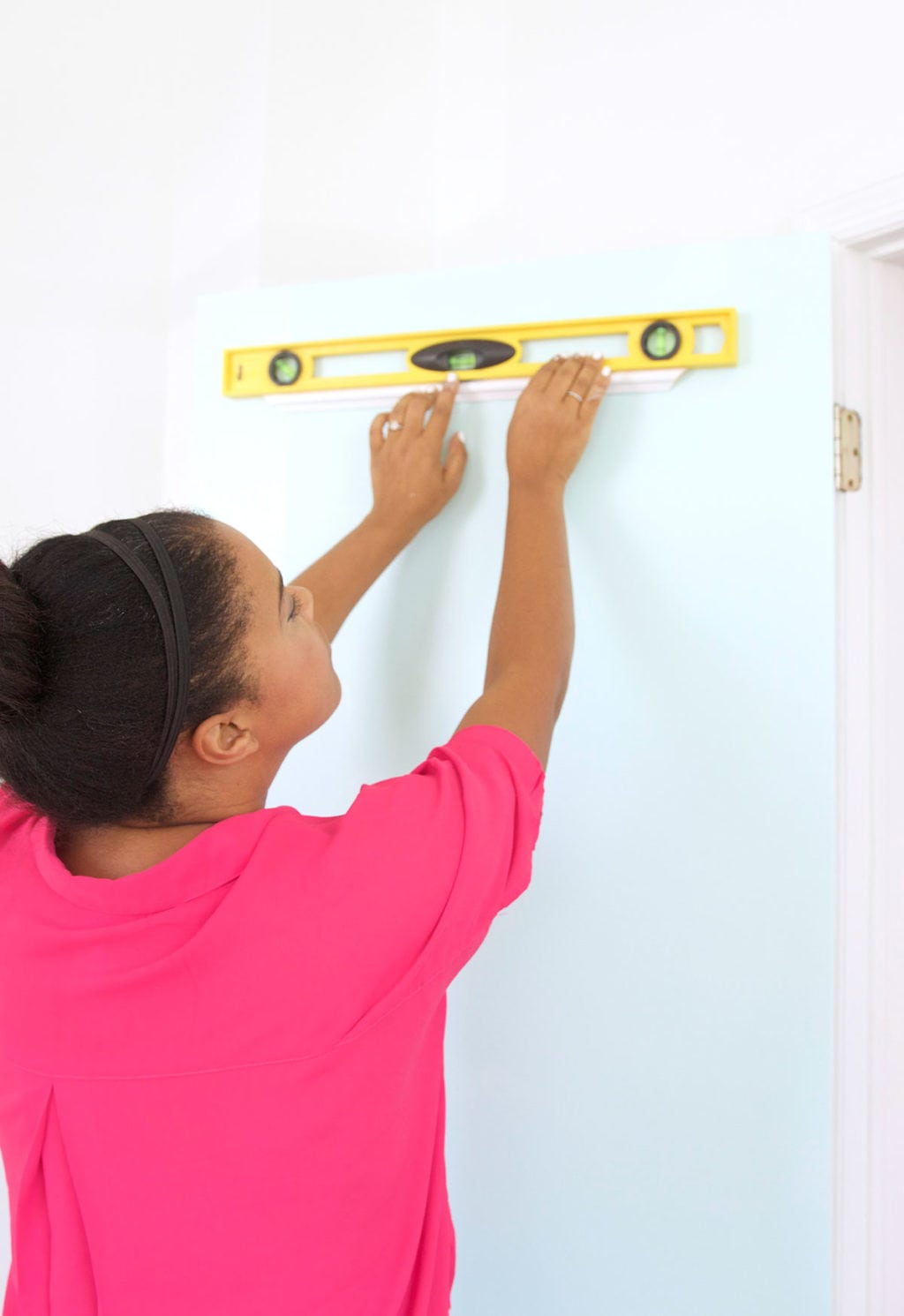 The DIY Stylish Painted Doors with Moulding are a simple and affordable way to upgrade a plain door into something impressive.