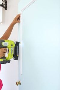 The DIY Stylish Painted Doors with Moulding are a simple and affordable way to upgrade a plain door into something impressive.