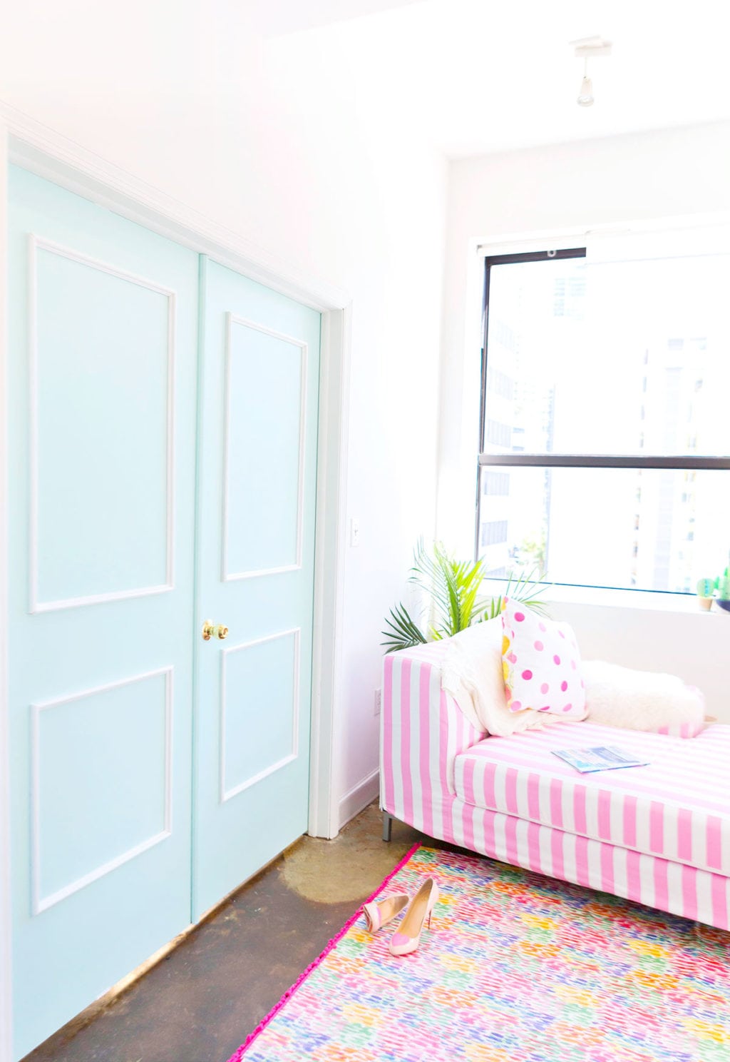 The DIY Stylish Painted Doors with Moulding are a simple and affordable way to upgrade a plain door into something impressive.