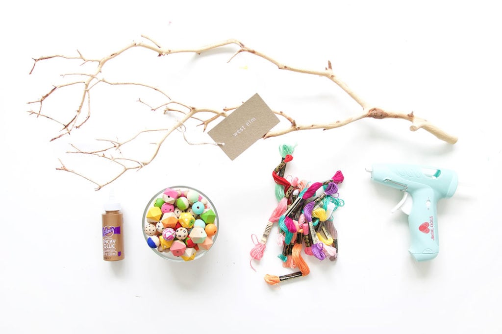 This painted wood bead manzanita branch is a funky take on the beauty of nature! A crafty way to use your painted wooden beads with a few basic supplies. 
