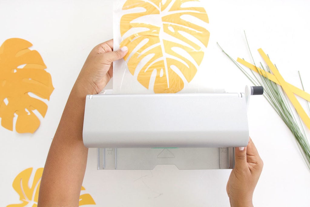 Autumn leaves are coming but I'm still holding on to summer. Combine both seasons with these DIY Paper Monstera Leaves made with a Cricut Explore