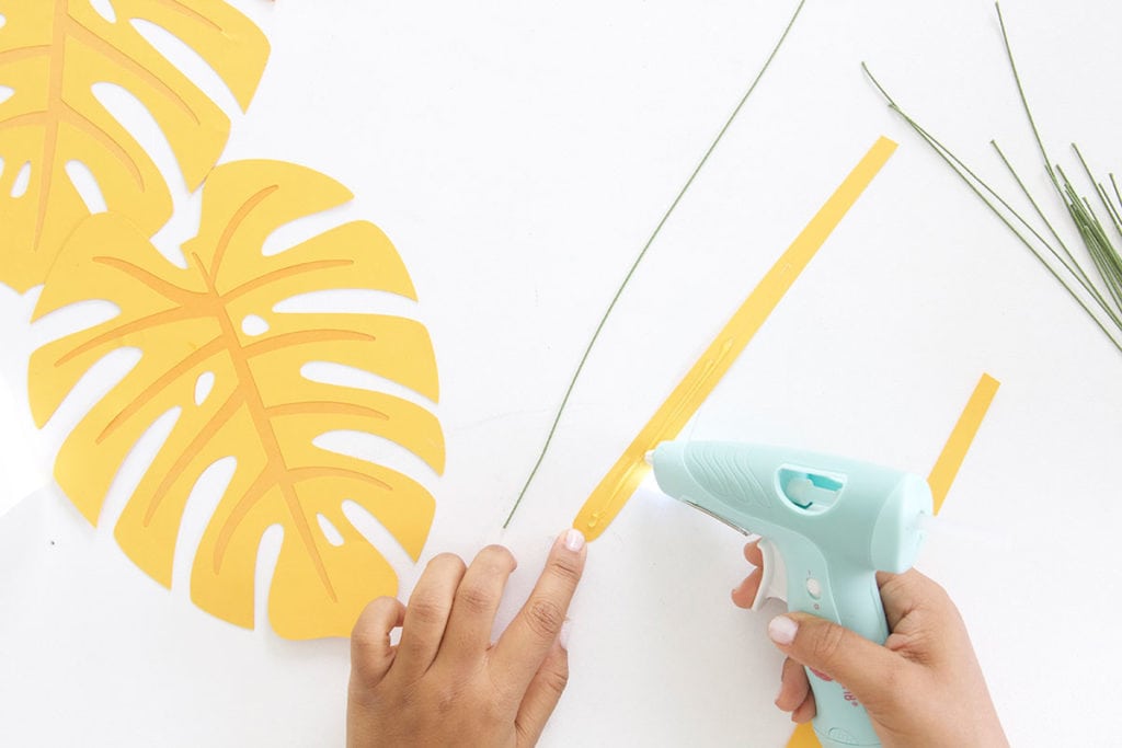 Autumn leaves are coming but I'm still holding on to summer. Combine both seasons with these DIY Paper Monstera Leaves made with a Cricut Explore