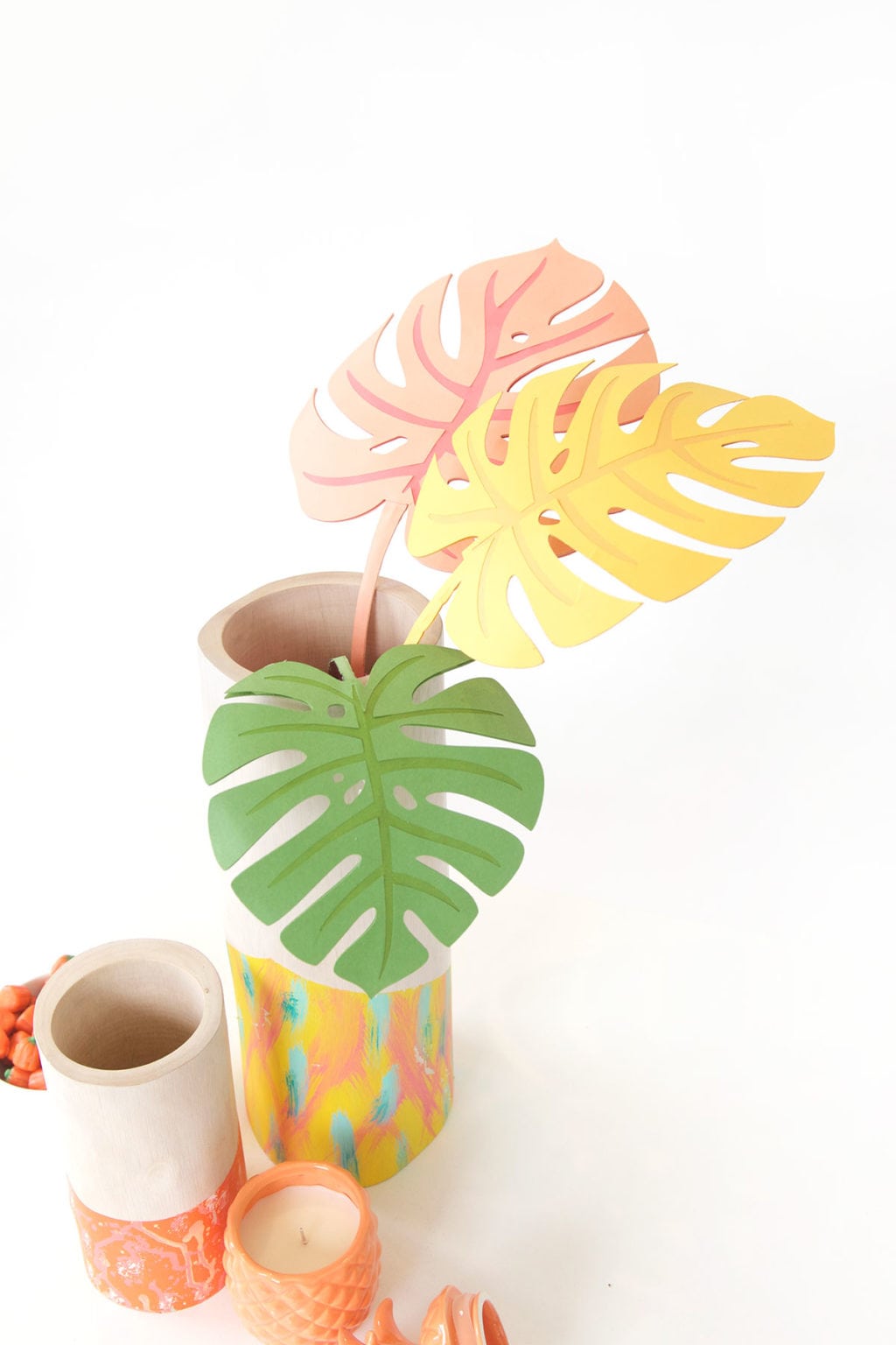 Autumn leaves are coming but I'm still holding on to summer. Combine both seasons with these DIY Paper Monstera Leaves made with a Cricut Explore