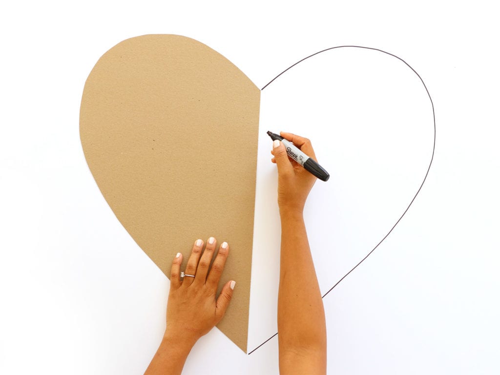 tracing a heart onto foam board