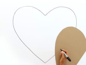 Tracing a heart image onto foam board
