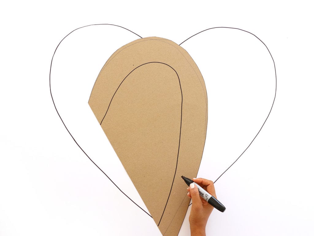 tracing a heart onto foam board