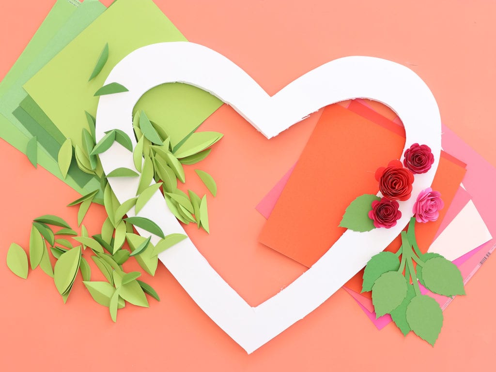 cut out leaves and paper flowers for wreath