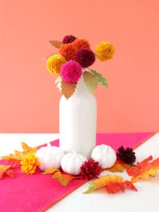 Fall Tablescape with yarn pom poms and Cricut glitter leaves